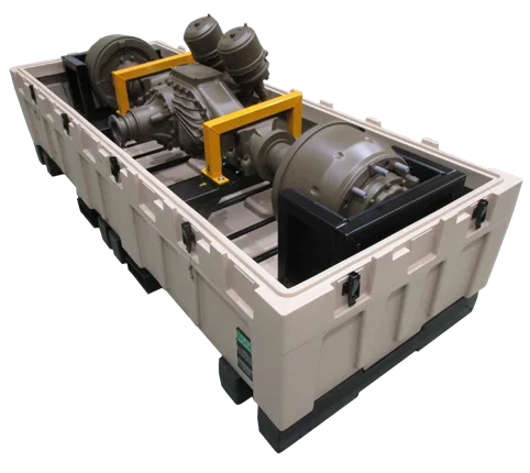Sand coloured Spacecase holding a machined gearbox assembly braced on yellow transit frames