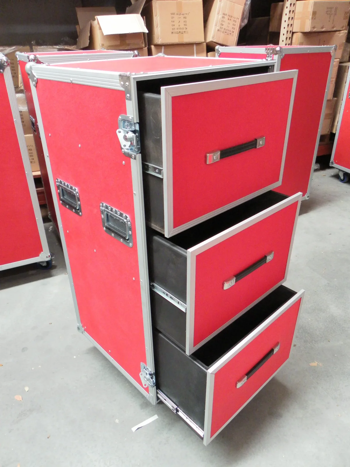 Red road case with all three drawers pulled out on full-extension runners